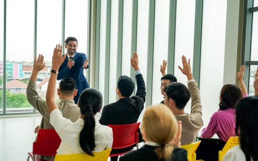 conference meeting. Business people sitting in a room listening to the motivator coach. Representation of a Self-growth and improvement special event