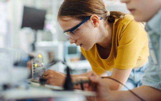 Two classmates working together on circuit board, building robot in an after-school robotics club. Children learning robotics in Elementary school. SSUCv3H4sIAAAAAAAACnRSy44cIQy8R8o/tDgPUj9gutlrlOOeVjlFObjBTKNlYAT0rFar/ffQrwmRkhsu2+Vy4Y+vX6qKjBCNJE/VxxLl2Fg7xxQgGe8yXJ92PKBTGErkHrpzXQJgygiVST4YsCU4QpKTgytm0M3WLvDnmiQxQZojxkXLDklIeMkcG/ig2AT/3OLqSKzJ3JFT5Lua5bbBqUjGeVySL3Ly3p6qb95avOCp+uHMHUM06b3CJMnRsYn4z4QXadBJ/Bf/s4kSrQWHfo5/2LbHr4dZl9z/vi5bmBDQImwm7PsRwWXdt7WivB8UZR1XdJC8p5prhrqTXT/0hwwiMBe1QtN27BhlUHM6MgWUA5c9Dm2NY/MobhqhlOBA26YBylTdUyEVUs34WY+9Hs5arPo30eT1LWG4lh8EszK++Ju7l2CXgq7YCcwNAvzVdwtGGncpEJ+m9boOJulnl8LiD3notd7fYLTL7eg8Bg98ghhzuTrwYrbMt+yvxRzn0+ruzkpUPrElbLruzFvWCVGLrm7EwPeC7Swnk3lWOQdRjuWrUeVWZlFAlGgZZzhShUpQlk3PrqKkg1acaY2Ze8yufv4GAAD//wMAhbDzl38DAAA=