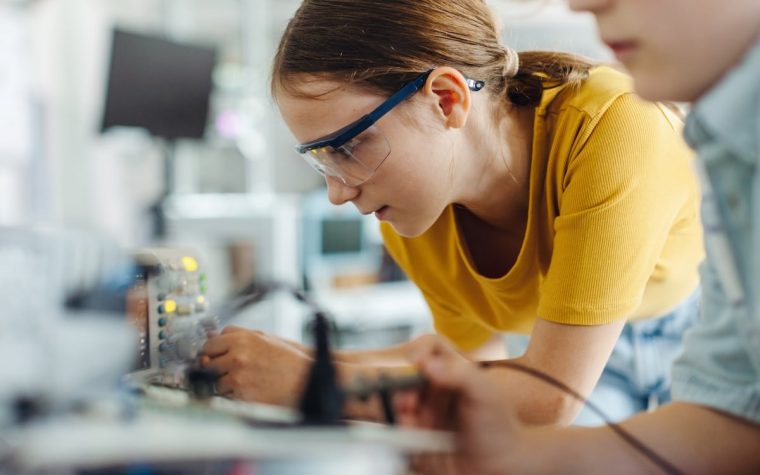 Two classmates working together on circuit board, building robot in an after-school robotics club. Children learning robotics in Elementary school. SSUCv3H4sIAAAAAAAACnRSy44cIQy8R8o/tDgPUj9gutlrlOOeVjlFObjBTKNlYAT0rFar/ffQrwmRkhsu2+Vy4Y+vX6qKjBCNJE/VxxLl2Fg7xxQgGe8yXJ92PKBTGErkHrpzXQJgygiVST4YsCU4QpKTgytm0M3WLvDnmiQxQZojxkXLDklIeMkcG/ig2AT/3OLqSKzJ3JFT5Lua5bbBqUjGeVySL3Ly3p6qb95avOCp+uHMHUM06b3CJMnRsYn4z4QXadBJ/Bf/s4kSrQWHfo5/2LbHr4dZl9z/vi5bmBDQImwm7PsRwWXdt7WivB8UZR1XdJC8p5prhrqTXT/0hwwiMBe1QtN27BhlUHM6MgWUA5c9Dm2NY/MobhqhlOBA26YBylTdUyEVUs34WY+9Hs5arPo30eT1LWG4lh8EszK++Ju7l2CXgq7YCcwNAvzVdwtGGncpEJ+m9boOJulnl8LiD3notd7fYLTL7eg8Bg98ghhzuTrwYrbMt+yvxRzn0+ruzkpUPrElbLruzFvWCVGLrm7EwPeC7Swnk3lWOQdRjuWrUeVWZlFAlGgZZzhShUpQlk3PrqKkg1acaY2Ze8yufv4GAAD//wMAhbDzl38DAAA=